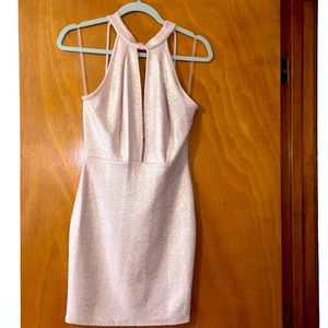 Medium, beige and gold knee length halter knight club dress.
